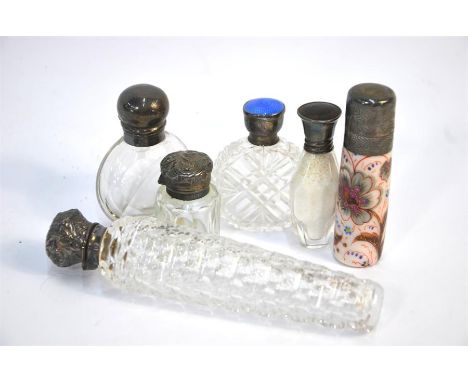 Five various Victorian and later small cut glass scent bottles with silver tops, to/w a thumbnail cut scent flask with white 