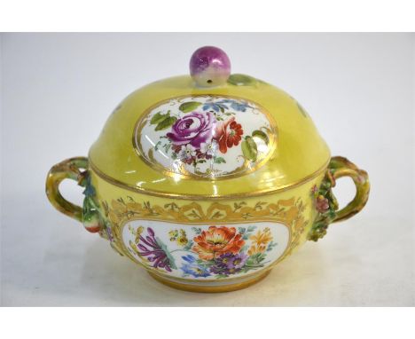 A 19th century Meissen porcelain circular bowl and domed cover, yellow ground, twisted naturalistic twin handles decorated in