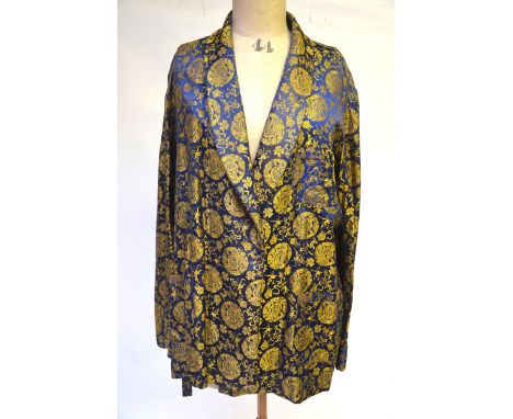 A vintage Chinese deep blue silk satin smoking/evening jacket with amber roundels and a Beatrice Von Frescher emerald green d