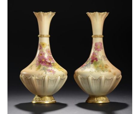 A PAIR OF ROYAL WORCESTER VASES, 1911  printed and painted with naturalistic flower sprays, 27cm h, printed mark, date code a