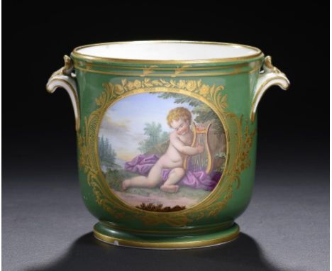 A SÈVRES STYLE GREEN GROUND SEAU, LATE 19TH C  painted to either side with a child emblematic of Poetry or Music in cisélé fr