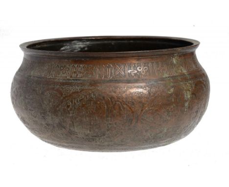 AN ISLAMIC BRASS BASIN, EGYPT OR SYRIA, 19TH C of compressed form, finely chased with scenes beneath an inscription, 19cm h, 