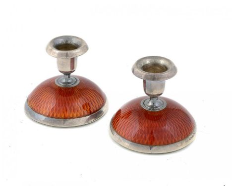 A PAIR OF NORWEGIAN SILVER AND CHERRY RED GUILLOCHE ENAMEL MINIATURE CANDLESTICKS 4.5cm h by Norsk Solvvareindustri, Oslo, 19