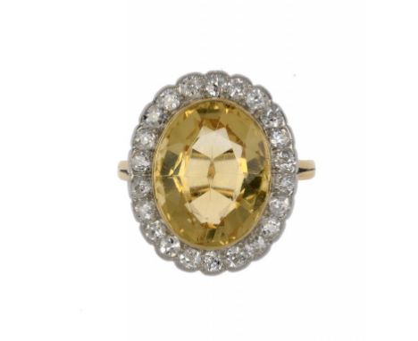 A CITRINE AND DIAMOND CLUSTER RING in gold with wirework hoop, size F ++Light wear only
