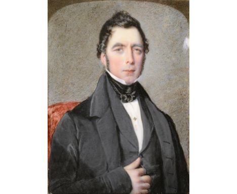 WILLIAM EGLEY (1798-1870) A GENTLEMAN OF THE PHILLIPS FAMILY  half length in a black coat and stock seated in a red chair, ar