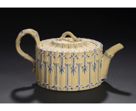 A WEDGWOOD CANEWARE BAMBOO TEAPOT AND COVER, C1785  the moulded detail heightened in blue and white enamel, 12.5cm h, impress