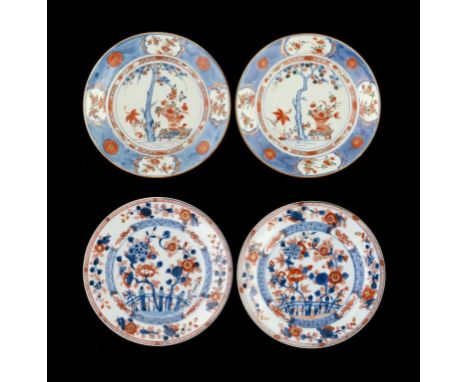 TWO PAIRS OF CHINESE IMARI PLATES, 18TH C   that with blue border painted with pine trees with green enamel detail, 22 and 22