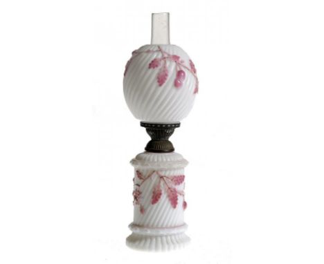 A MOULDED WHITE GLASS AND PINK PAINTED OIL LAMP AND SHADE, LATE 19TH C   both spirally reeded, brass burner, 30cm h excluding