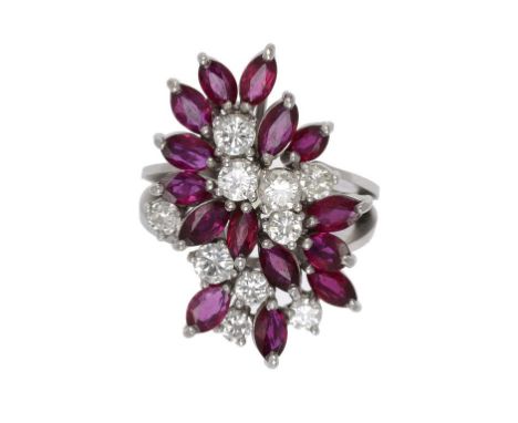 A RUBY AND DIAMOND RING, C1960  with navette shaped rubies and round brilliant cut diamonds, in white gold, unmarked, size L 