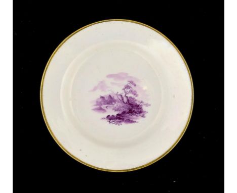 A PINXTON CUP PLATE, C1800 painted in purple monochrome with a landscape, 12.5cm diam A monochrome version of pattern 218.  A