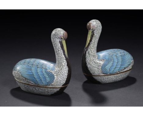A PAIR OF CHINESE CLOISONNÉ ENAMEL BOXES AND COVERS IN THE FORM OF A CRESTED IBIS, C MID 20TH C  12cm h ++In fine condition, 