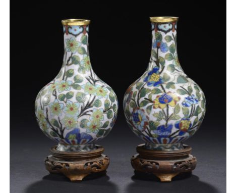 A PAIR OF CHINESE CLOISONNÉ ENAMEL OFF WHITE GROUND VASES, 20TH CENTURY 12.5cm h, wood stands ++Slight horizontal fracture be