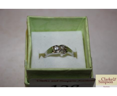 A .925 white stone set buckle ring