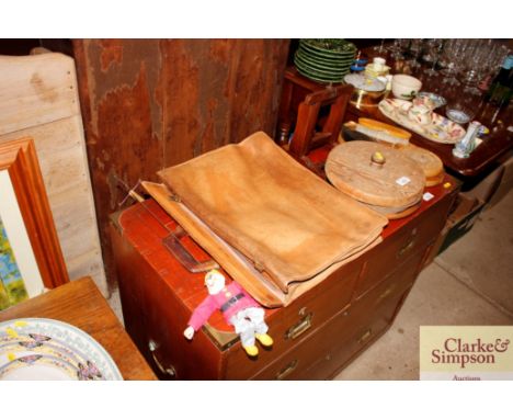 A vintage leather attaché case and various wooden items 