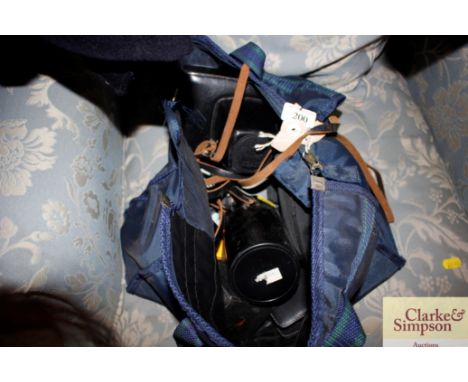A bag containing various camera equipment 