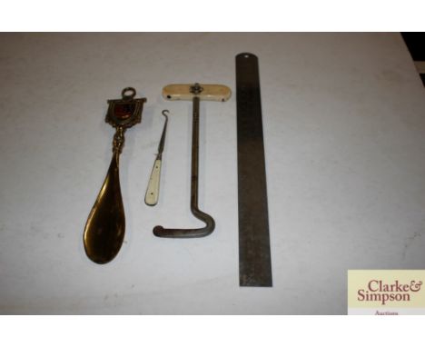 A boot pull; a button hook etc.