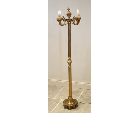 An Italian gilt metal standard lamp, mid 20th century, stamped 'F.B.A.L Italy' to underside of base, the urn shaped finial ab