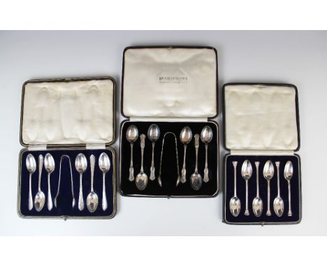 A cased set of six George V silver teaspoons by Josiah Williams &amp; Co, London 1923, with stylized Corinthian column handle