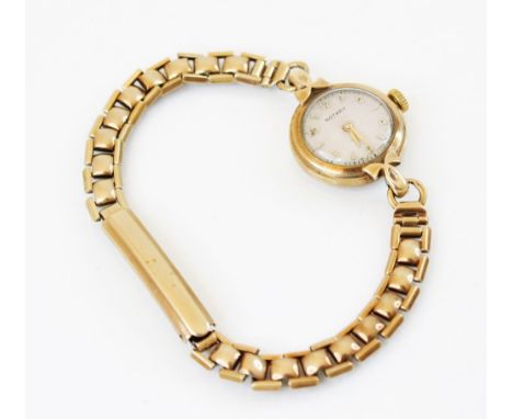 A lady's vintage 9ct gold Rotary wristwatch, the round cream dial with Arabic and baton markers, set to a plain polished 9ct 