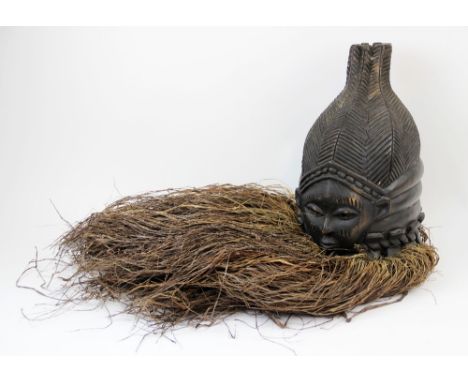 A West African Mende Sierra Leone helmet mask with raffia, 40cm 
