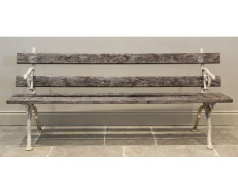A 19th century Coalbrookdale style bench, the pair of cast naturalistic branch bench supports united by four hardwood slats, 