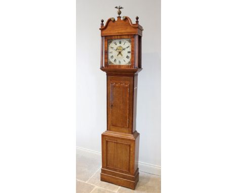 A George III oak and mahogany cross banded thirty hour longcase clock signed Thomas W M Hay, Shrewsbury, the 29cm painted dia