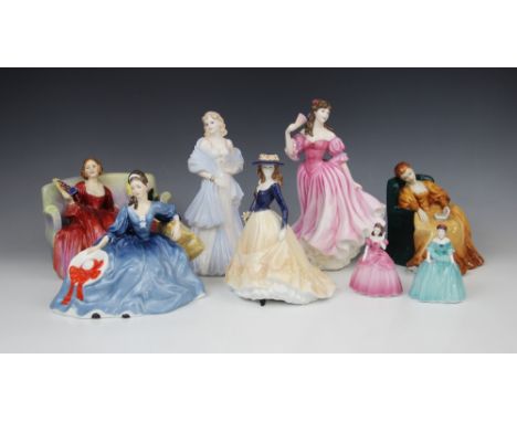 A collection of Royal Doulton figurines, comprising: HN3975 'Lauren' (figure Of The Year 1975), HN1298 'Sweet &amp; Twenty', 