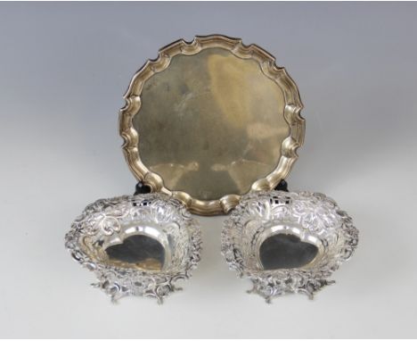A pair of Victorian silver heart-shaped pin dishes by Josiah Williams & Co, London 1893, with pierced foliate decorated borde