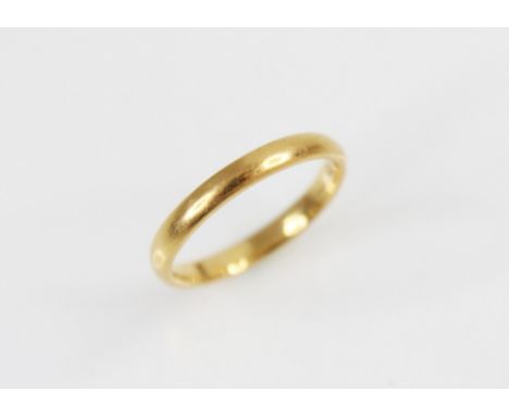 A 22ct gold wedding band, ring size H 1/2, weight 2.4gms 