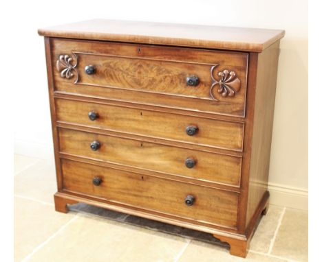 A mid 19th century mahogany secretaire chest of drawers, the fall front top drawer applied with moulded detail opening to a c