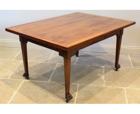 A 19th century French cherry wood draw leaf dining table, the rectangular table top above an angular frieze, raised upon legs