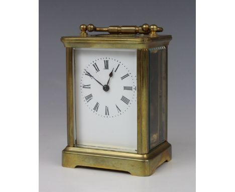 A late 19th century French brass carriage timepiece, by R & Co, Paris, the 5cm white dial applied with Roman numerals enclosi