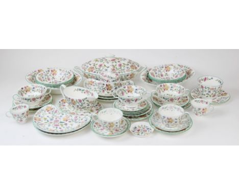 A Minton 'Haddon Hall' pattern part dinner service, comprising: an oval serving dish and cover, two oval serving dishes, a sa