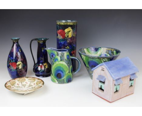 A 'Ruben Ware' jug by S. Hancock &amp; Sons, early 20th century, of lobed baluster form with tapering neck, hand painted over