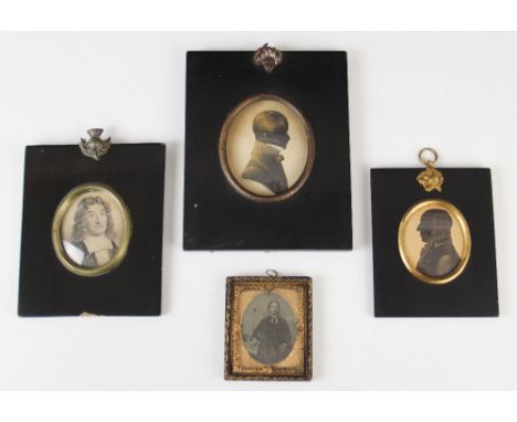 A framed silhouette miniature, 19th century, depicting William Freeman of Ely facing dexter, with a further framed silhouette