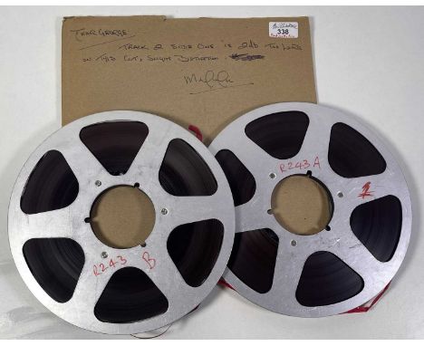 Two reels of 1/4" recording tape, each with 10.5" diameter, marked by pen to one 'R243A' and to the other 'R243B', containing