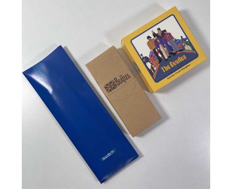 Assorted Beatles collectables to inc: limited edition Fossil made Yellow Submarine watch in tin, with original box, 1998. A c