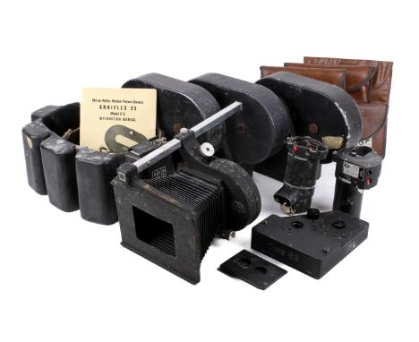 An assortment of Arriflex and other cine camera parts. To include an Arriflex 35 II C manual, a set of Arri belows, a Pag Pow
