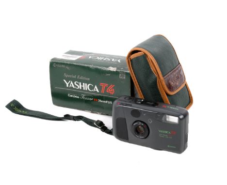 A Yashica T4 'Safari' Special Edition 35mm compact camera. Green. Serial number 665792. Powers on, shutter and flash working.