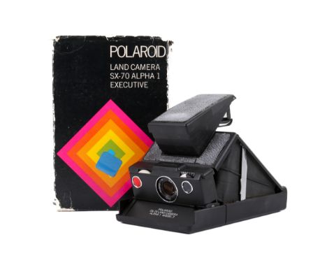 A Polaroid SX-70 Land Camera Alpha 1 Model 2. Black body and black leatherette. With makers box and instruction manual. Untes