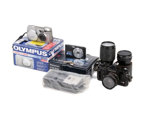 A Yashica FX-3 Super 35mm camera outfit and two compact digital cameras. The Yashica FX-3 Super with two lenses; a Yashica 50