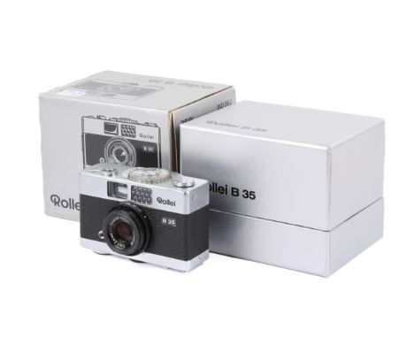 A Rollei Singapore B 35 35mm compact camera. Chrome. With a Carl Zeiss 40mm f3.5 Triotar lens, case and makers box. Shutter w