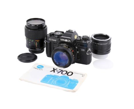 A Minolta X-700 35mm SLR camera outfit. With two lenses; a Minolta 50mm f1.7, and a Centon Auto Zoom28-70mm f3.5-4.5. Togethe