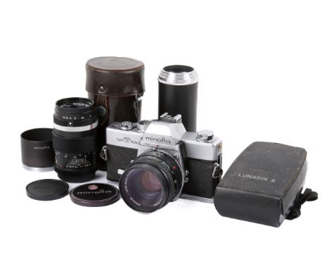 A Minolta SRT101B 35mm SLR camera outfit. Chrome body. Serial number 4411921. With two lenses; a Minolta 50mm f1.7 MD Rokkor 