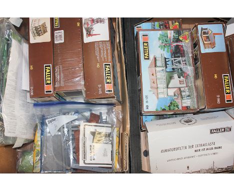 A large quantity of 00 scale model railway accessories, including eight Faller buildings, unbuilt and boxed