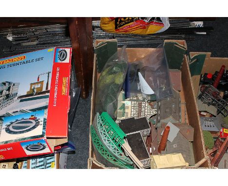 A large collection of model railway accessories including a Hornby Railways 00 gauge turntable set and a Triang Railways turn