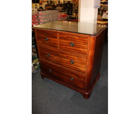 A mahogany chest  of two short over two long drawers, on bracket feet, 91.5cm
