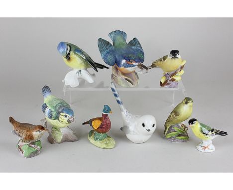A Karl Ens porcelain blue tit, four Royal Worcester porcelain birds, kingfisher, wood warbler, wren, marsh tit, a Crown Staff