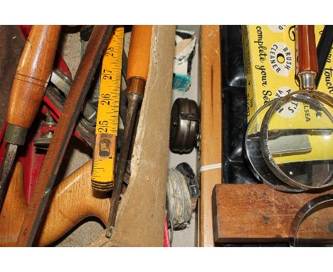 A collection of tools including planes, chisels and measuring tapes, together with a quantity of artist's materials and other