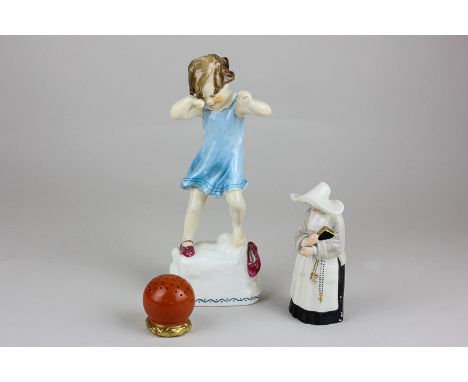 A Royal Worcester porcelain candle snuffer modelled as a nun, a Royal Worcester porcelain figure of Wednesday's child is full